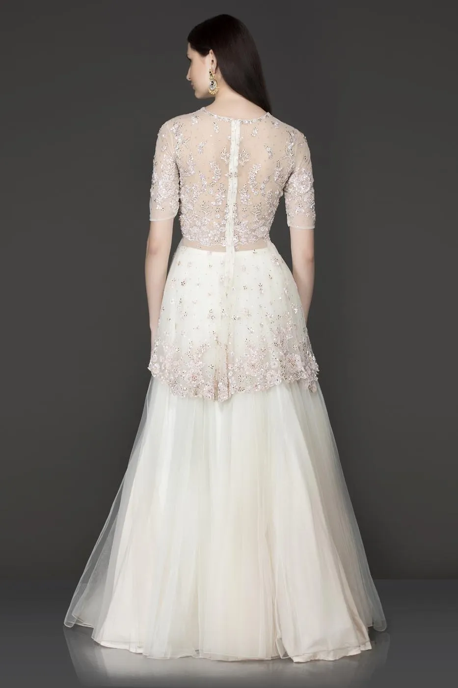 White Colour Net Peplum Top And Net Skirt With Pink Sequence Embroidery