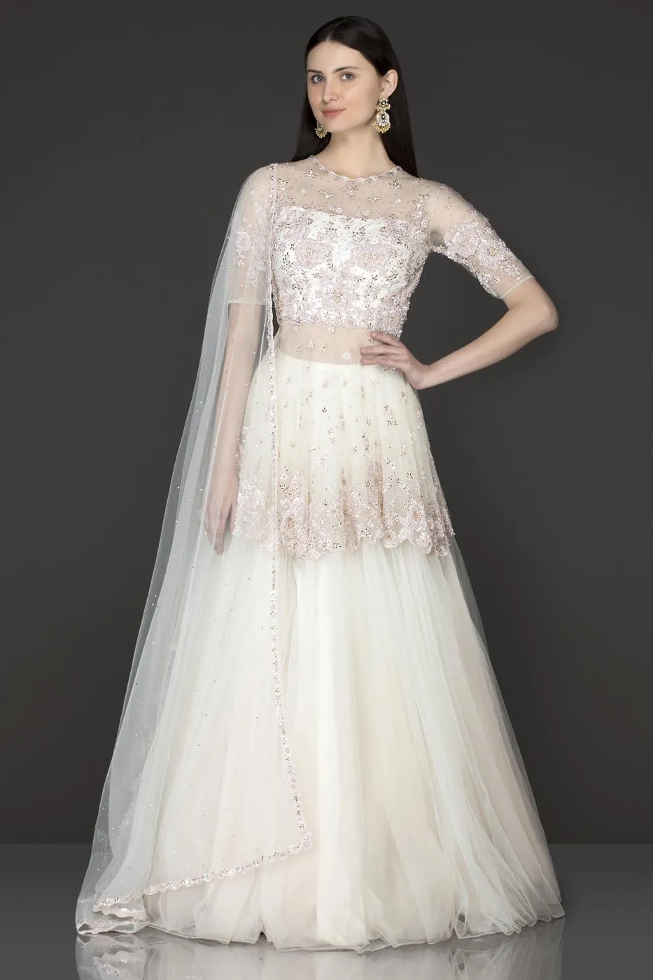 White Colour Net Peplum Top And Net Skirt With Pink Sequence Embroidery